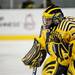 Michigan junior goaltender Adam Janecyk gets in a ready stance for a face-off in the game against Western Michigan on Saturday. Daniel Brenner I AnnArbor.com